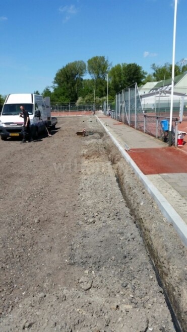 Beregening tennisbaan in Rotterdam