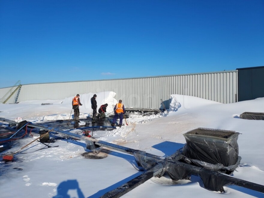 Sneeuw verwijderen fabrieksdak